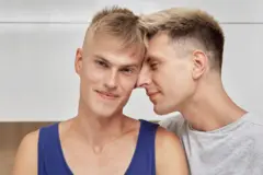 Two gay guys in an intimate embrace